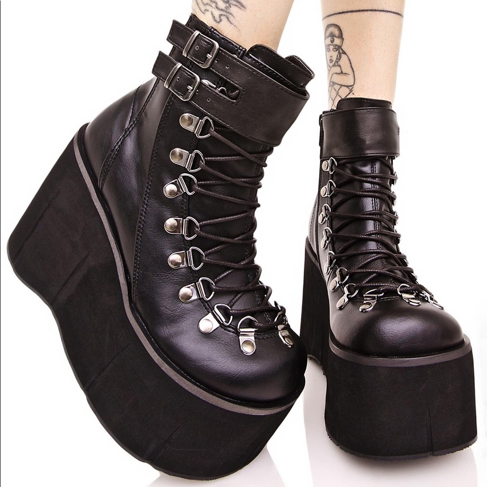 DEMONIA KERA LACE-UP PLATFORM BOOTS
